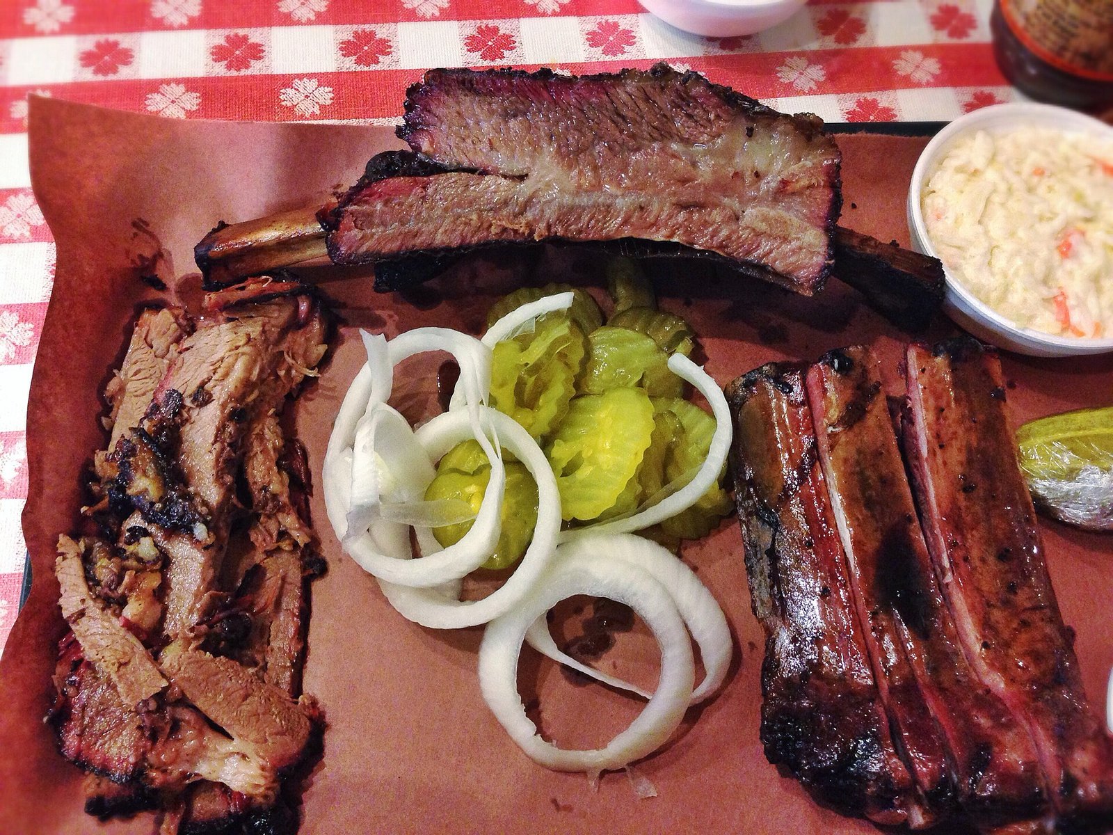 Barbecue platter with smoked brisket, pulled pork, and Brunswick stew, Georgia