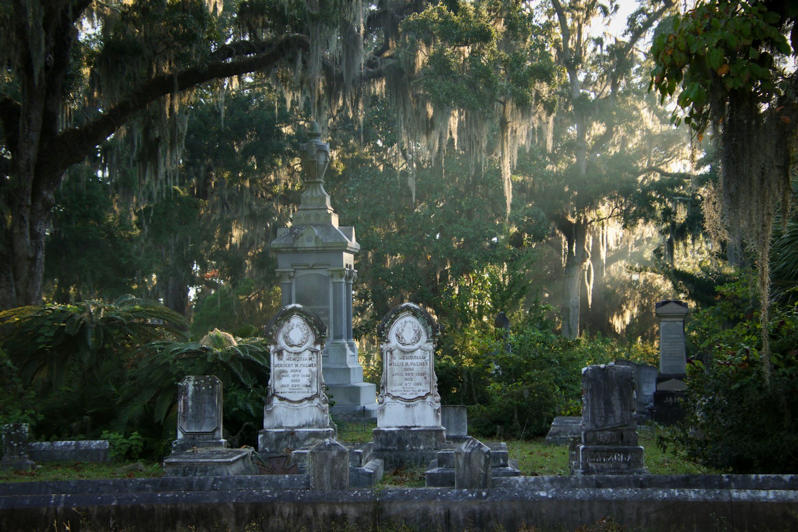 Monuments under live oaks and Spanish moss at Bonaventure Cemetery, Savannah, Georgia