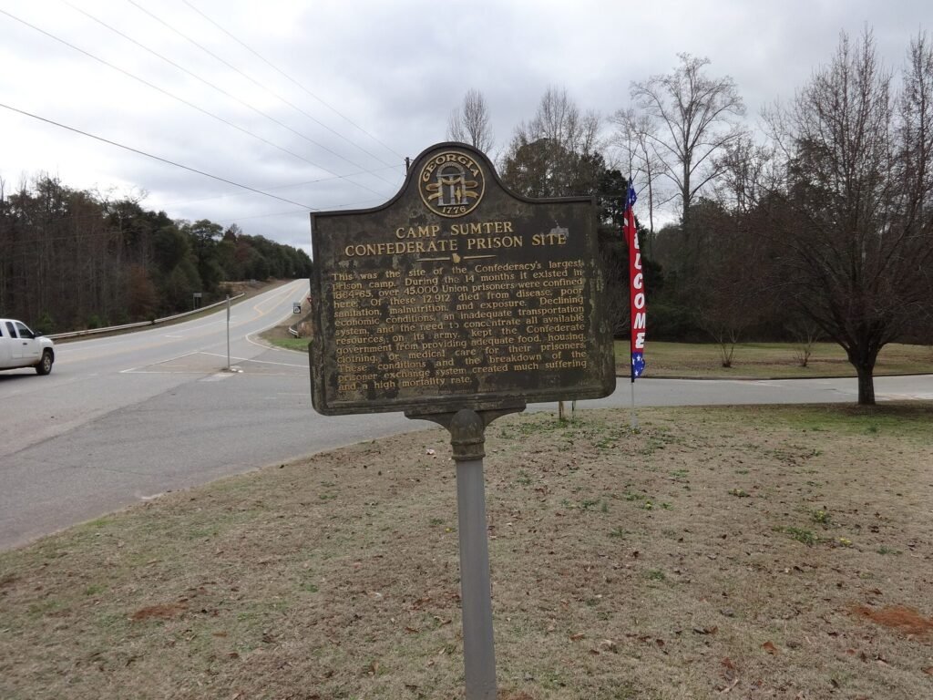 The Georgia historical marker for the Camp Sumter Confederate Prison Site at Andersonville