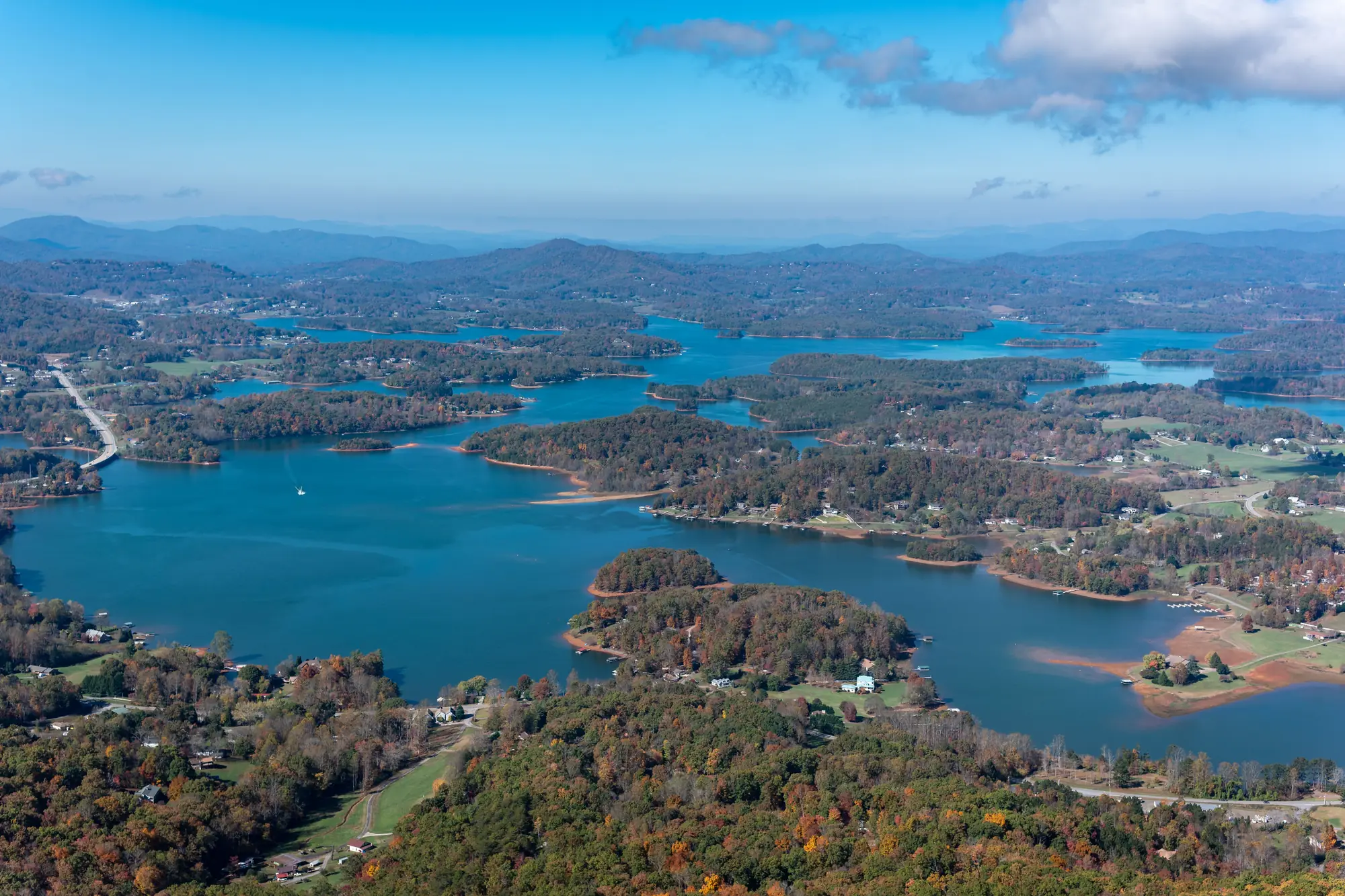Lake Chatuge winding between wooded Appalachian ridges at Hiawassee, Georgia, seen from the air