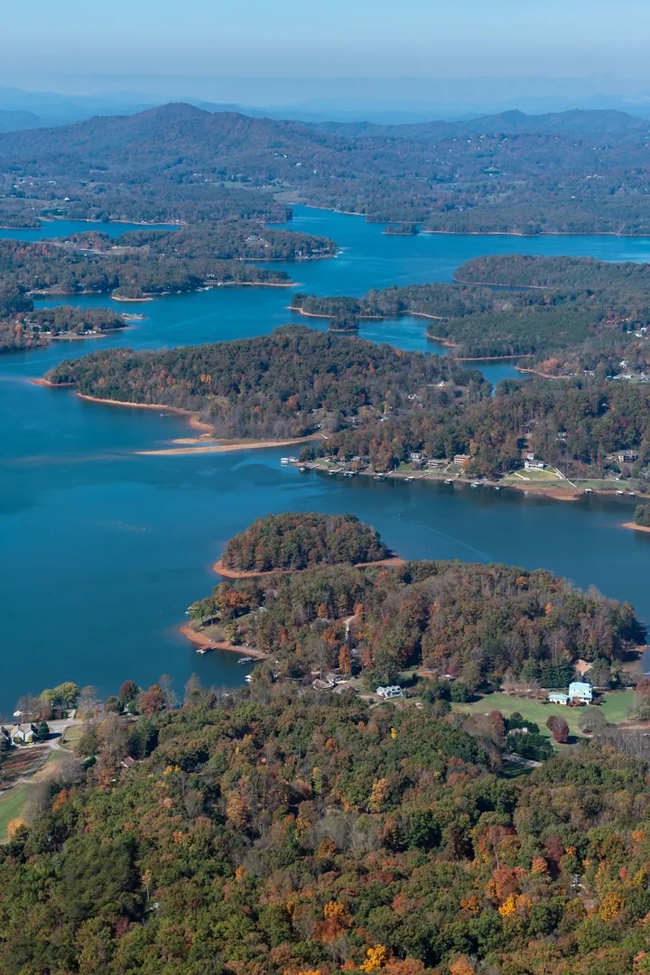 Lake Chatuge winding between wooded Appalachian ridges at Hiawassee, Georgia, seen from the air