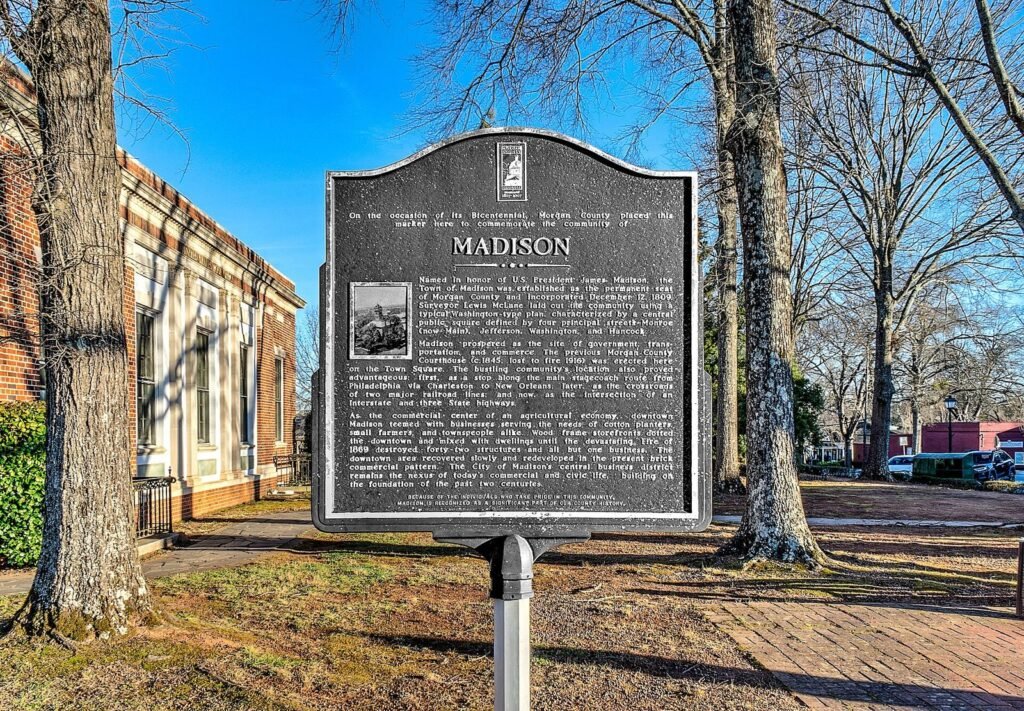 The Georgia historical marker titled "Madison" on a downtown street in Madison, Georgia