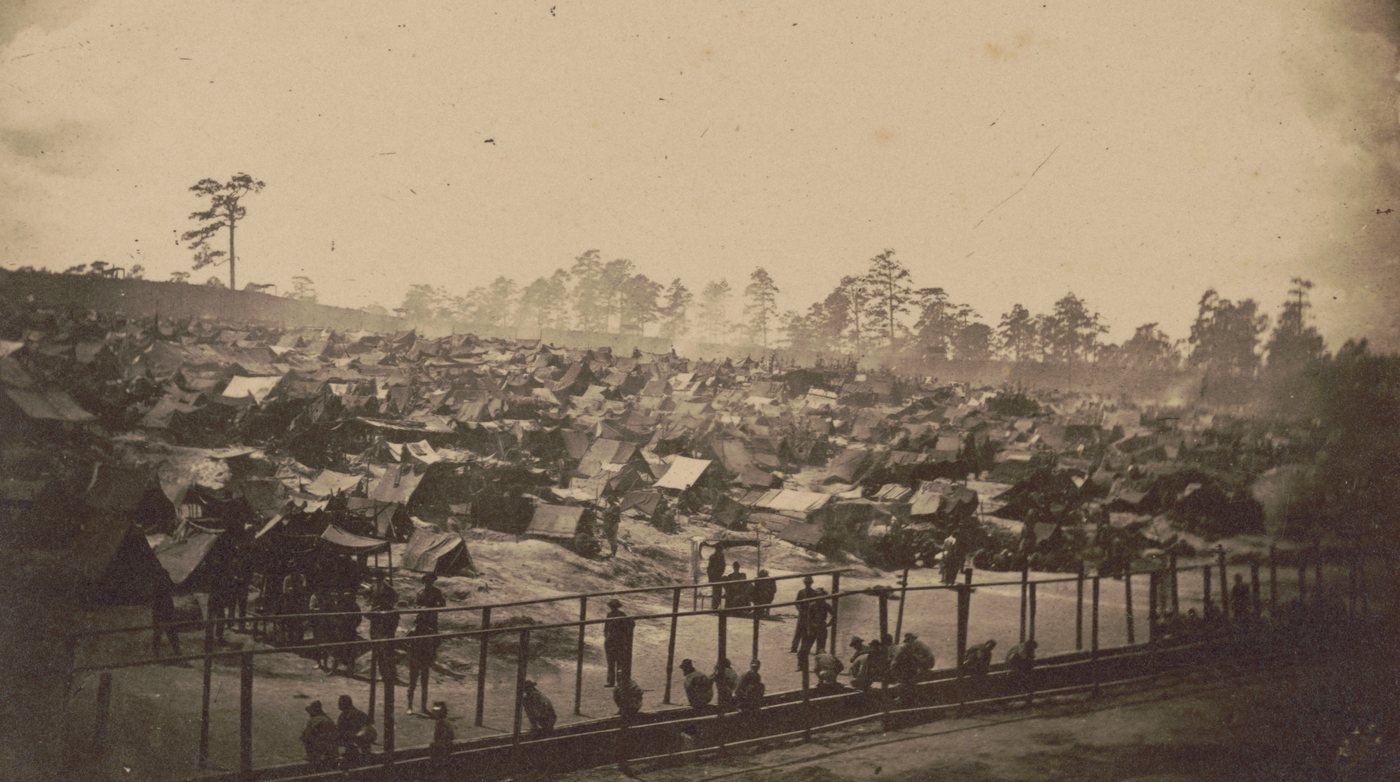Andersonville Prison stockade seen from the south-east, crowded with prisoners and shelters
